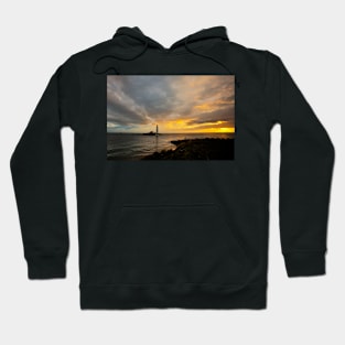 Golden sunrise over St Mary's Island Hoodie